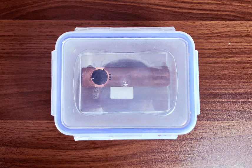 Seal the copper flashlight in a plastic bag or container